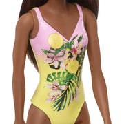 Barbie Doll Features Long Brunette Hair And Stylish Floral Swimsuit.